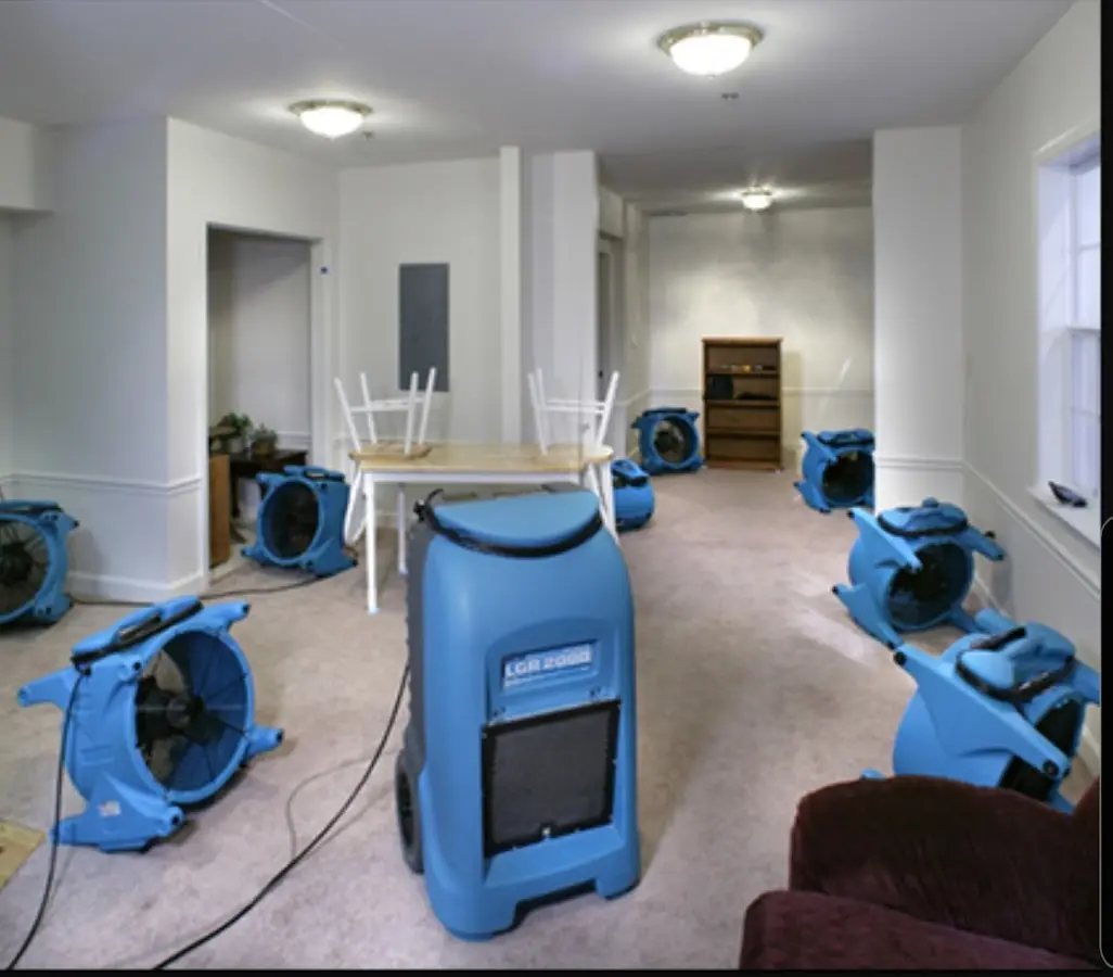 Air movers and dehumidifier setup for Water Damage Restoration in Centreville